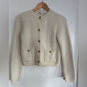 LIKE NEW- Zara cream sweater with gold hardware. Worn once only Like new.